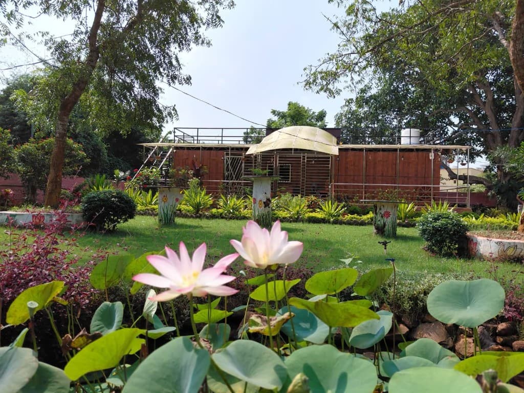 Aamaghara garden with lotus pond and nature-first cottage in Bhubaneswar